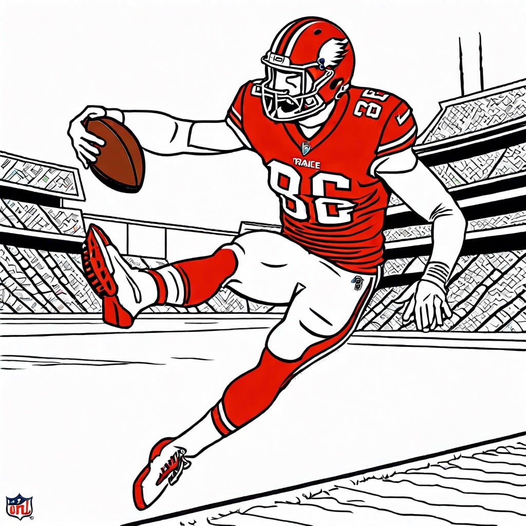 travis kelce in action making a touchdown catch